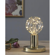 Decoled meleg fehér fényű LED dekorációs izzó áttetsző üveggel, melynek belsejében egy 25 égős fényfüzér került elhelyezésre