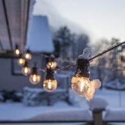 20 izzóból álló LED dekoráció izzósor. Fekete kábellel és áttetsző izzókkal.