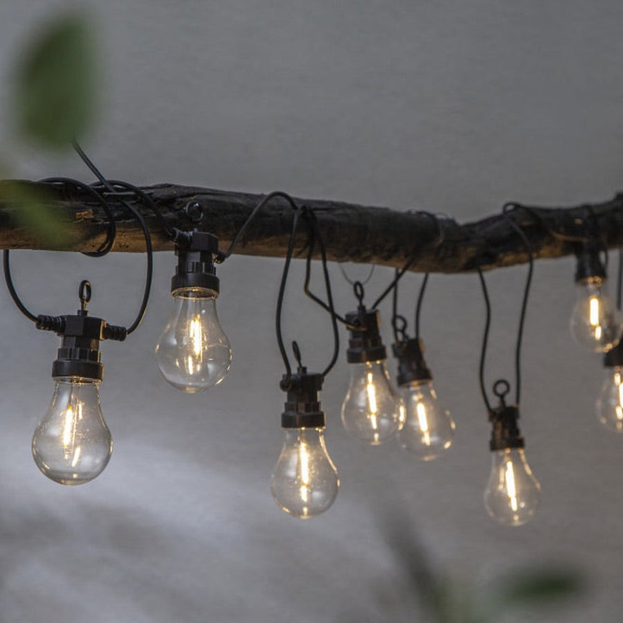 Kültéri LED dekorációs izzósor. 10 darab áttetsző búrás izzóval, fekete kábellel.