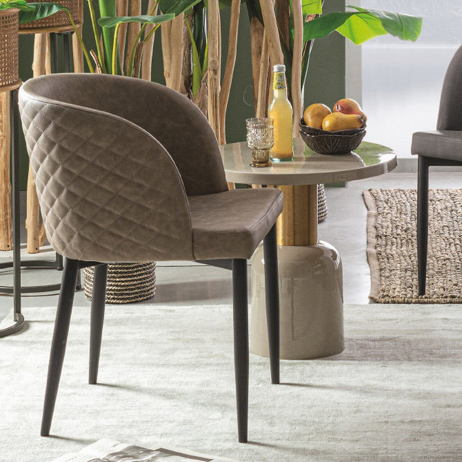 Kortárs, zománcozott acélból készült, krémfehér és arany színű kerek kisasztal.