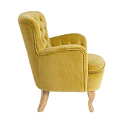 Vintage stílusú, mustársárga színű, bársonyhatású pamutszövettel kárpitozott fenyőfa fotel.