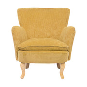 Retró stílusú, okkersárga színű, kordbársony-hatású szövettel kárpitozott kaucsukfa fotel.