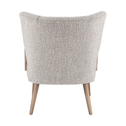 Retró stílusú, világosszürke szövettel kárpitozott kaucsukfa klubfotel.