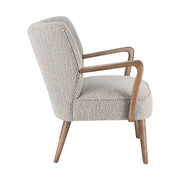 Retró stílusú, világosszürke szövettel kárpitozott kaucsukfa klubfotel.