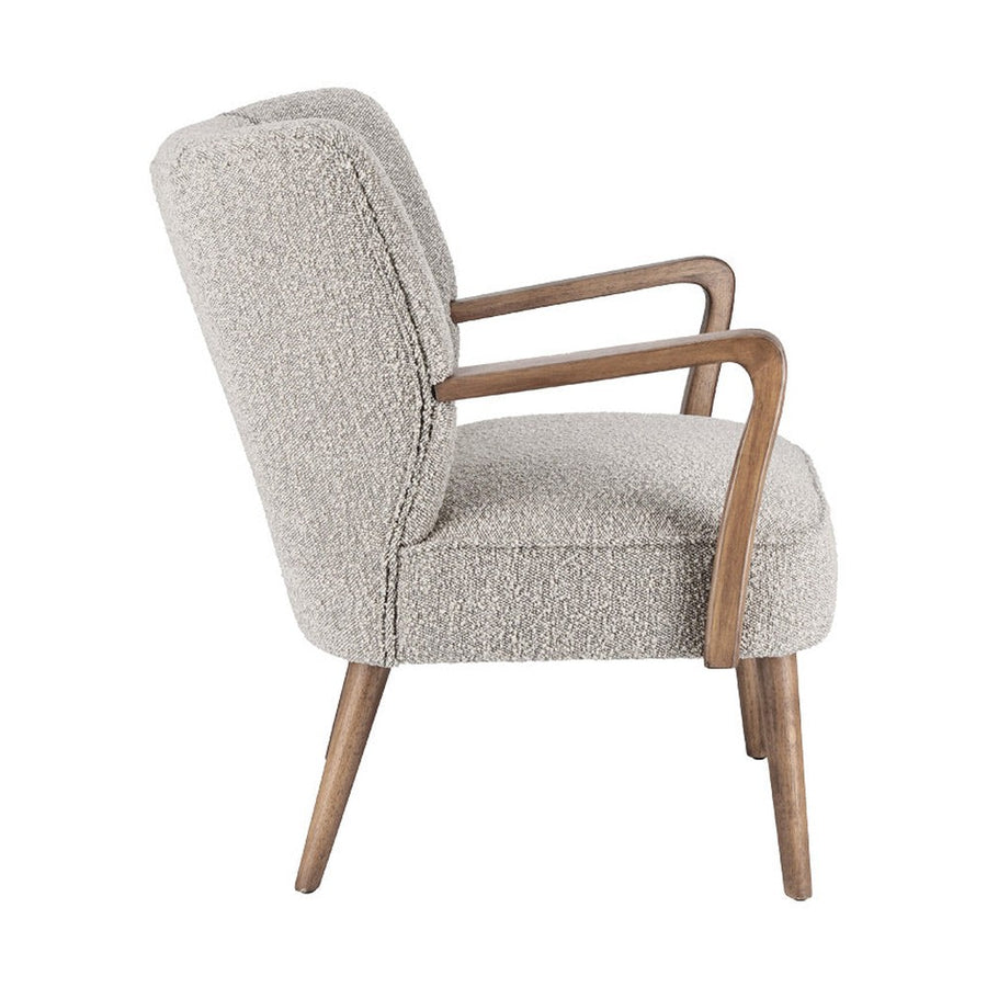 Retró stílusú, világosszürke szövettel kárpitozott kaucsukfa klubfotel.