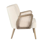 Retró stílusú, fehér színű bársonyhatású szövettel kárpitozott kaucsukfa klubfotel.