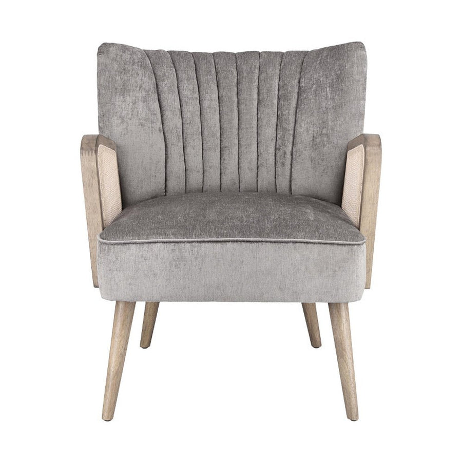 Retró stílusú, világosszürke bársonyhatású szövettel kárpitozott kaucsukfa klubfotel.