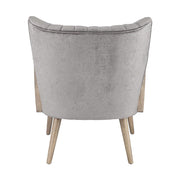 Retró stílusú, világosszürke bársonyhatású szövettel kárpitozott kaucsukfa klubfotel.