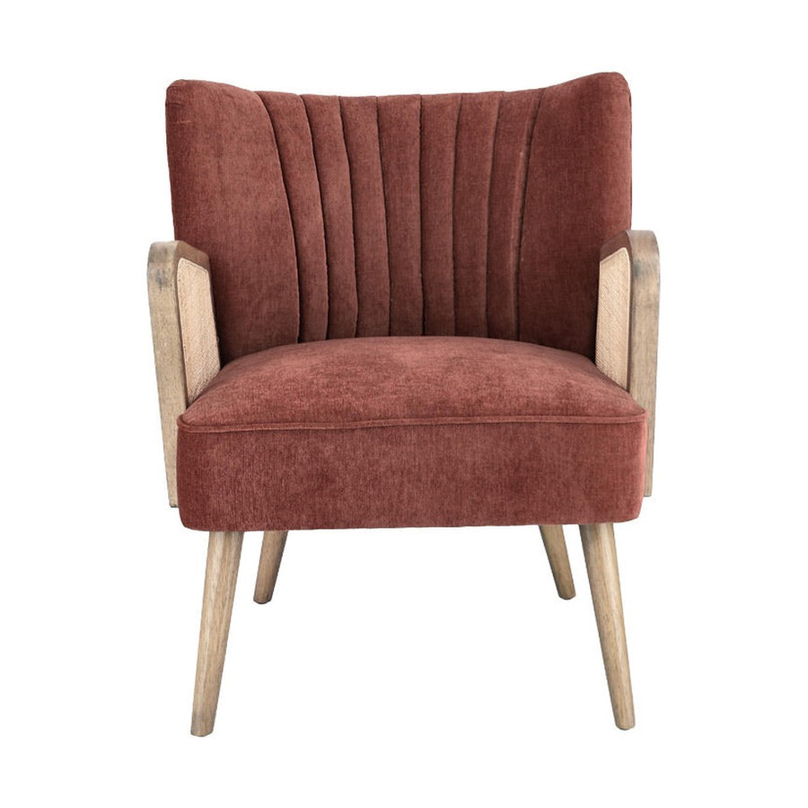 Retró stílusú, téglavörös színű bársonyhatású szövettel kárpitozott kaucsukfa klubfotel.