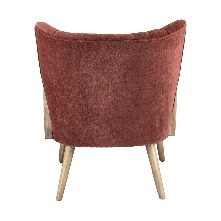 Retró stílusú, téglavörös színű bársonyhatású szövettel kárpitozott kaucsukfa klubfotel.