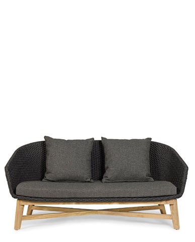 Prémium kategóriás, design kerti kanapé sötétszürke színű párnákkal.