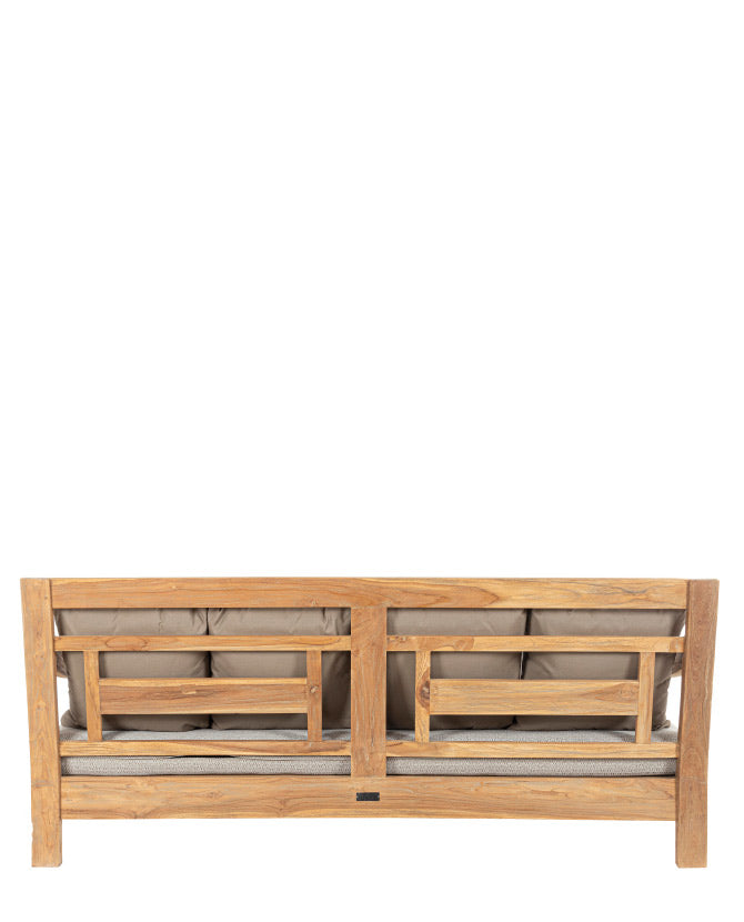 Keleti stílusú teakfa kanapé bézs színű ülő- és hátpárnákkal.