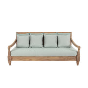 Keleti stílusú teakfa kanapé zöldeskék ülő- és hátpárnákkal.