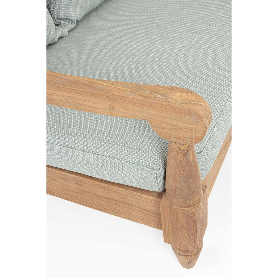 A fotel részletfotója, a homokfúvott karfáról, lábakról és a zöldeskék olefin szövetről.