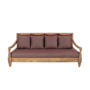 Keleti stílusú teakfa kanapé bordó színű ülő- és hátpárnákkal.