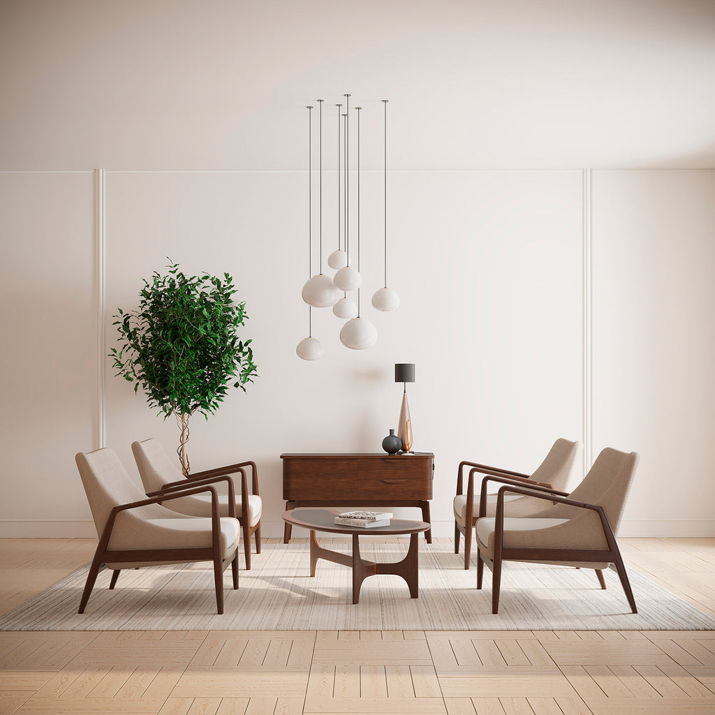 Modern nappaliban, dohányzóasztal körül álló négy darab kortárs, design fotel.