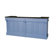 Fenyőfa bárpult dekoratív, kazettás jellegű dekorációval, polcokkal és fiókkal.