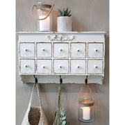 Provanszi stílusú, antik krémszínű fiókos szortírozó polc.