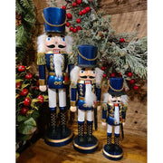 Klasszikus stílusú, kék színű, 28 cm magas, fa diótörő katona ablakos dobozban