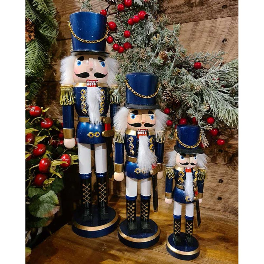 Klasszikus stílusú, kék színű, 28 cm magas, fa diótörő katona ablakos dobozban