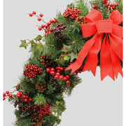 Vidéki stílusú, 180 cm hosszú karácsonyi fenyőgirland piros bogyókkal.