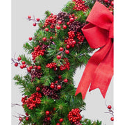 Vidéki stílusú, erdei bogyós, 102 cm átmérőjű karácsonyi koszorú masnival.