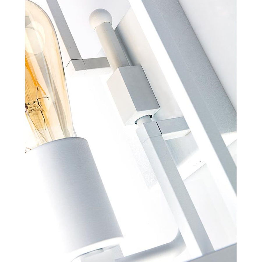 Industrial stílusú, rézből készült, matt fehér színű falilámpa. Oldalnézet.