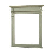 Country stílusú fenyőfakeretes tükör, klasszicizáló faragásokkal. Olívazöld színű.