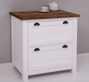 Fehér színű, tömör fenyőfából készült polcos konyhaszekrény, sötétbarna tölgyfa fedlappal.