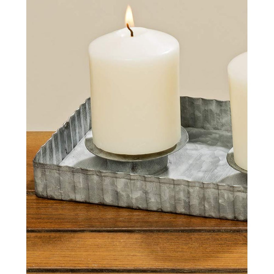 Négyágú, bádog gyertyatartó tálca.