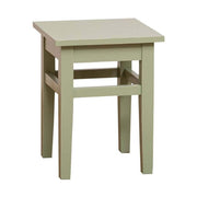 Olívazöld színű klasszikus kivitelezésű hokedli. 