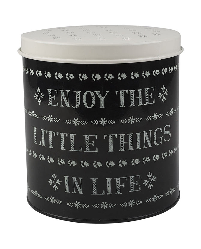 Fémből készült, fekete és fehér színű, motívumokkal és "Enjoy the little things in life" felirattal díszített konyhai tárolódoboz
