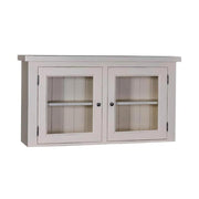 Bézs-színű fali konyhaszekrény, két üveges ajtóval. A tárolást egy polc segíti elő.