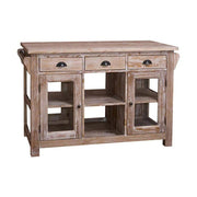 Country stílusú konyhasziget hat fiókkal, két oldalt üveges tárolóval, nyitott tárolóval. A bútort mélycsiszolásos technikával kezelték, így gyönyörűen kirajzolódnak rajta a fa erezetes mintái.