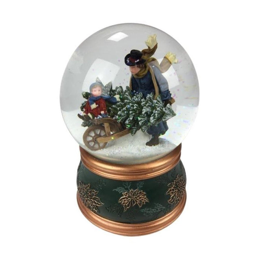 Exkluzív megjelenésű, 10 cm átmérőjű és 14 cm magas, karácsonyi zenélő-forgó hógömb, fenyőfával megrakott, talicskát toló viktoriánus korabeli apukával és kislányával.