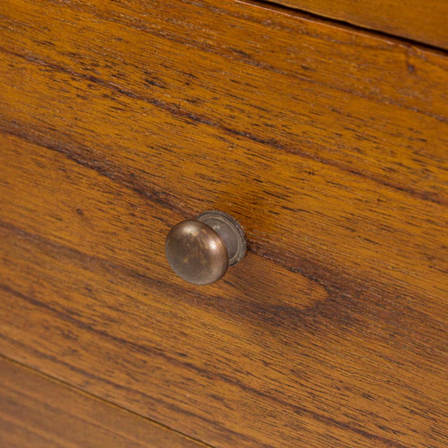 Bronzból készült kerekded fiókgomb.