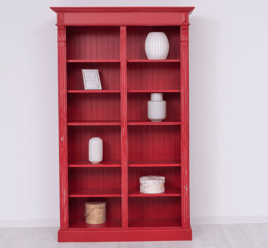 Klasszikus stílusú, kétosztatú tömör fenyőfa könyvesszekrény. Antikolt piros színű.