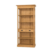 Klasszikus stílusú könyvesszekrény öt polccal és két fiókkal. Színe: pácolt natúr.