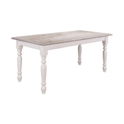 Fenyőfa étkezőasztal tölgyfa asztallappal, dekoratívan faragott lábakkal.