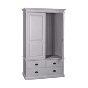 Fenyőfa gardróbszekrény kétszárnyas, kazettás ajtóval, két kisebb valamint egy nagy fiókkal. Színe halvány szürke.
