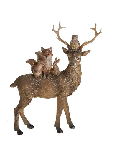 Barna színű, csillámos felületű, 24 cm magas, karácsonyi szarvas figura erdei állatok társaságában.