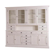 Nagyméretű, fenyőfa tálalószekrény. A tárolásról a négy darab üveges ajtó mögött található polcok, az esztétikusan elhelyezett tizenkét polc, valamint a két darab ajtós tároló mögött található tér gondoskodik. A bútor színe fehér.