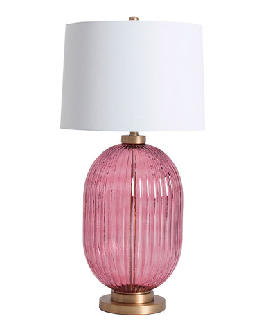 Kortárs stílusú, rózsaszínű színű üvegből és fémből készült asztali lámpa fehér lámpaernyővel.