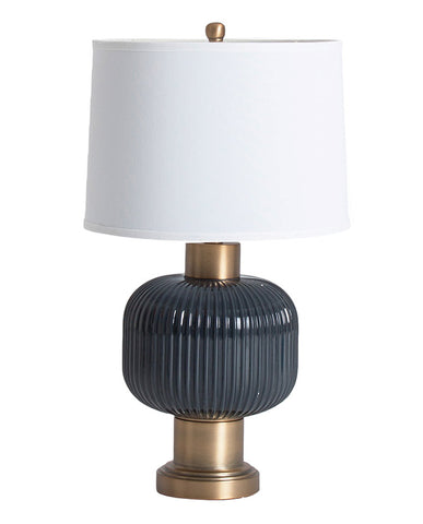 Kortárs stílusú, sötétszürke színű üvegből és fémből készült asztali lámpa fehér színű lámpaernyővel.