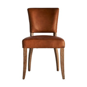 Kortárs stílusú étkezőszék nyírfából és bőrből.