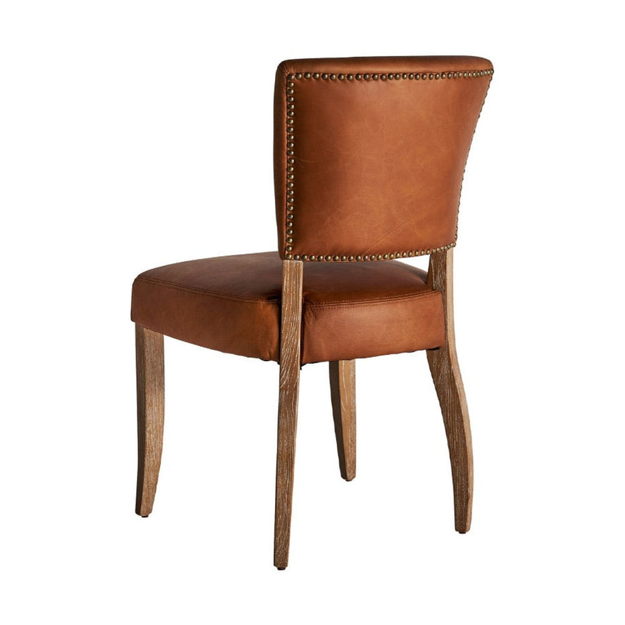 Kortárs stílusú étkezőszék nyírfából és bőrből.