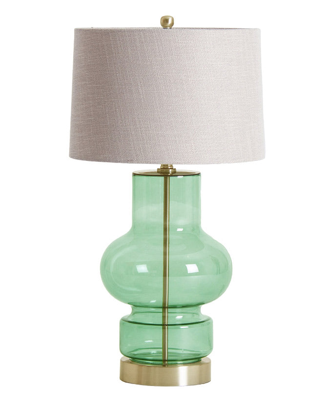 Kortárs stílusú, zöld színű üvegből és fémből készült, dizájn asztali lámpa bézs színű lenvászon lámpaernyővel.