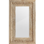 Keleti stílusú, dekoratív faragásokkal díszített falitükör mangófakerettel.