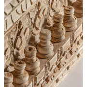 Keleti stílusú, dekoratív faragásokkal díszített falitükör mangófakerettel.