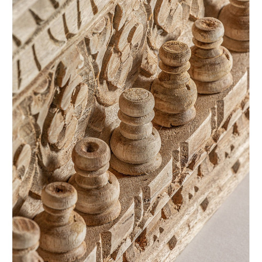 Keleti stílusú, dekoratív faragásokkal díszített falitükör mangófakerettel.